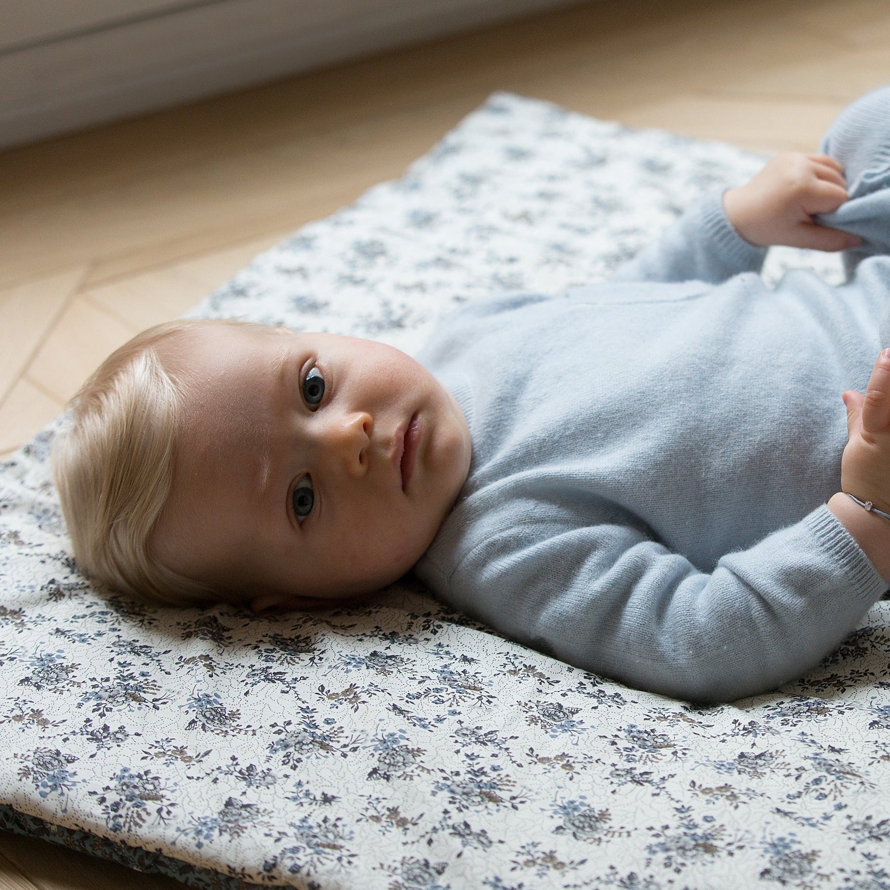 Picture of a baby on a playing mat